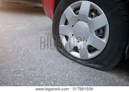 The Punched Wheel Of The Car Close-up