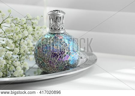 Beautiful Catalytic Purifying Lamp And Flowers On Window Sill, Space For Text. Interior Element