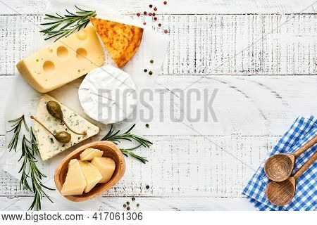 Set Or Assortment Cheeses. Suluguni With Spice, Camembert, Blue Cheese, Parmesan, Maasdam, Brie Chee