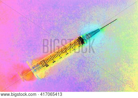 Syringe With Hypodermic Needle Abstract. Opiate And Heroin Overdoses Have Skyrocketed In Recent Year