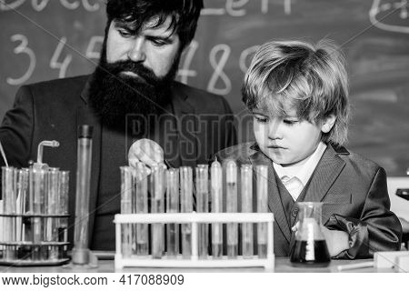 Chemistry Experiment. Teacher Child Test Tubes. Cognitive Process. Kids Cognitive Development. Menta