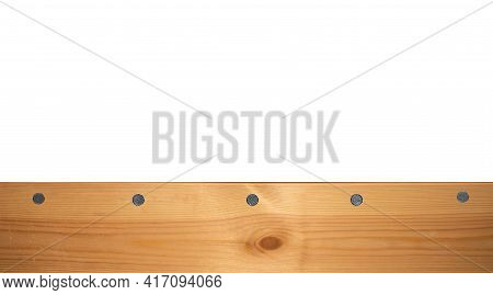 Top View Light Wood Texture Surface With Natural Pattern And Metal Nail Heads Or Hats. Wooden Pine B