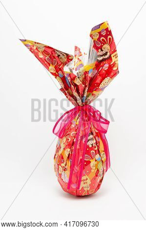 Fuji City, Shizuoka-ken, Japan - April 1, 2021: Easter Egg - Homemade Chocolate Egg With Red Ribbon.