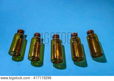 Used Vials Of Drugs Are On The Table