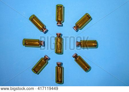 Used Vials Of Drugs Are On The Table