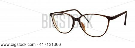 Modern Glasses Stay On White Background. Vision Concept. Way To Improve Eyesight. Isolated. High Qua