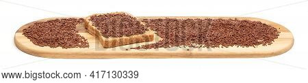 Typical Dutch Chocolate Sprinkles (hagelslag) On A Slice Of Bread, Served On A Wooden Plate, Isolate