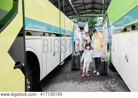 Muslim Holiday Trip Riding A Bus Together With Family