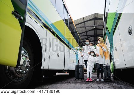 Muslim Holiday Trip Riding A Bus Together With Family