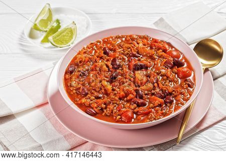 Vegetarian Meatless Chili With Kidney Beans And Lentils In A Bowl On A White Wooden Table, American 