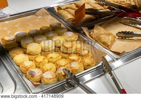 Curd Cakes, Curd Cakes, Pancakes On The Distribution Line, Self-service Restaurant. Copispace