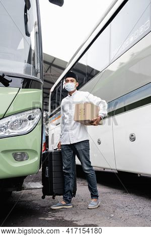 Male Muslim Travel By Bus During Pandemic