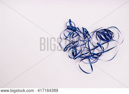 Heart Made Of Shiny Ribbon. On A White With Copy Space.