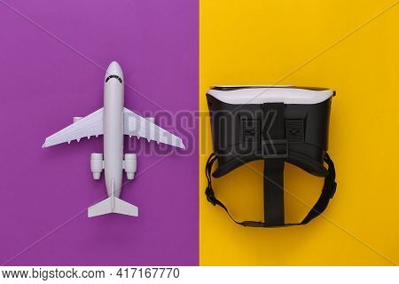 Virtual Travel. Virtual Reality Headset With Plane On Yellow Purple Background. Top View