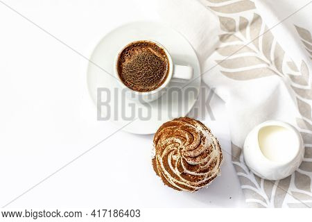 Dark Chocolate And Cocoa Chocolate Cupcakes With A Cup Of Hot Black Coffee. Space For Text