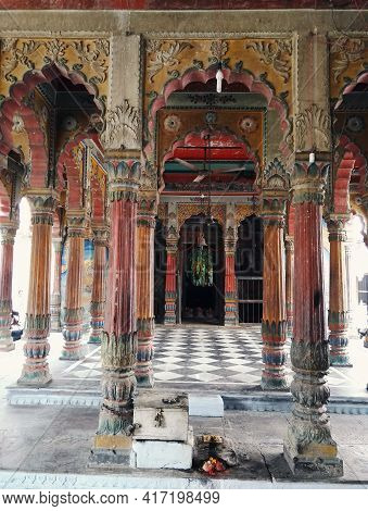Varanasi, India - November 01, 2016: Interior Of An Empty Ancient Hindu Temple With Stone Carved Des