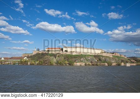 Petrovaradin Fortress In Novi Sad, Serbia, On Danube River, On A Sunny Summer Afternoon. It Is One O