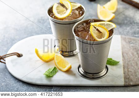 Lemon Mint Julep Cocktail In Traditional Glasses