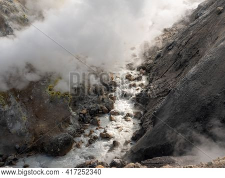 Panorama View Of The Opasny Canyon Near The Mutnovsky Volcano. The Depth Of The Canyon Surprises Wit