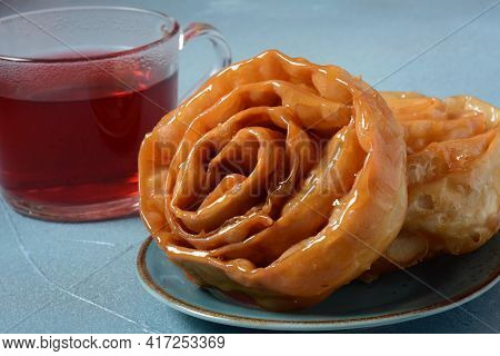 Fresh Baked Chebakia For Ramadan. Chebakia Moroccan Pastries. Made Of Strips Of Dough Rolled To Rese