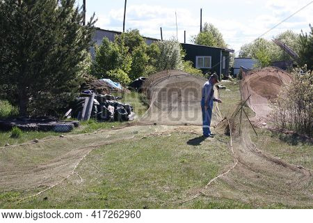 Russia, Lake Ladoga, Nazia Village 27.05.2020 Preparation Of Fishing Traps