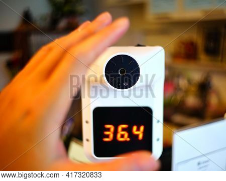 Body And Hand Temperature Scanner. Thermal Sensor Technology For Covid-19 Quarantee Area.