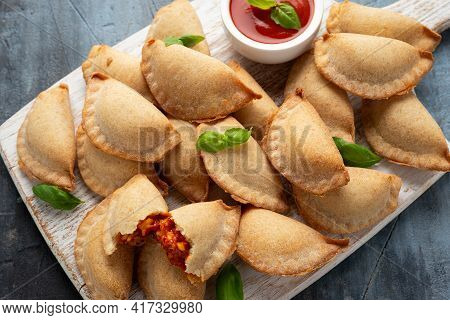 Margarita Margherita Pizza Parcels Pockets Filled With Tomato, Mozzarella Cheese And Basil Served On