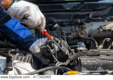 Check Engine Ignition System And Change Ignition Coil. Car Care Service.
Replacing Ignition Coil And