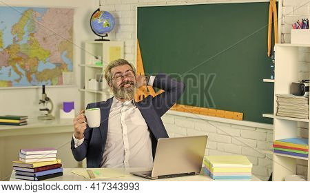 Its Coffee Break. Senior Teacher Drink Coffee In Restroom. Enjoying Rest During School Break. Break 