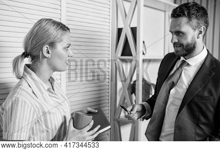 Love Affair At Work. Business Couple. Handsome Man Speak To Cute Woman In Office. Office Life. Boss 