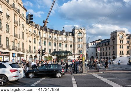 Munich, Germany - September 15, 2018: 
Traditional German City Street With Old Houses Facades, Cafes