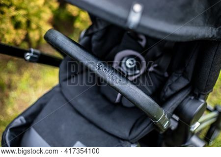Budapest, Hungary - April 18, 2021: Cybex Priam Black Stroller Or Pram In The Park. Infant Carriage