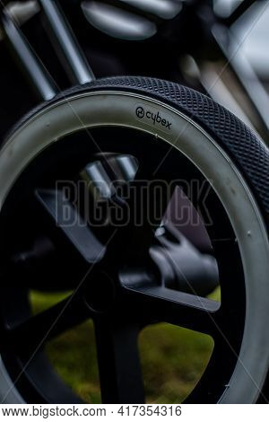 Budapest, Hungary - April 18, 2021: Cybex Priam Black Stroller Or Pram In The Park. Infant Carriage
