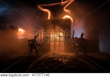 Medieval Battle Scene. Silhouettes Of Figures As Separate Objects, Fight Between Warriors At Night.