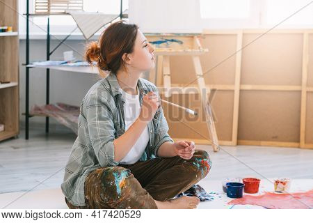 Painting Hobby. Artist Lifestyle. Imagination Creativity. Inspired Relaxed Thoughtful Woman With Pai