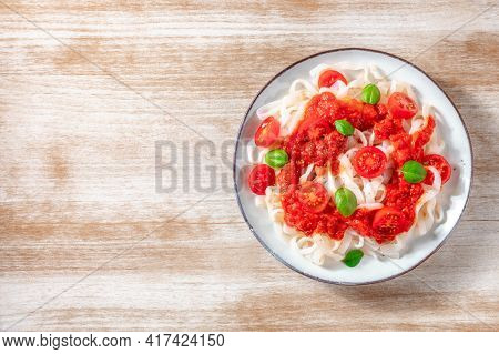 Konjac Pasta With Tomatoes And Basil, Shot From Above With A Place For Text