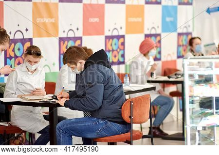 A Medical Worker At A Shopping Center Registers A Male Recipient Of The Covid-19 Vaccine In Chelyabi