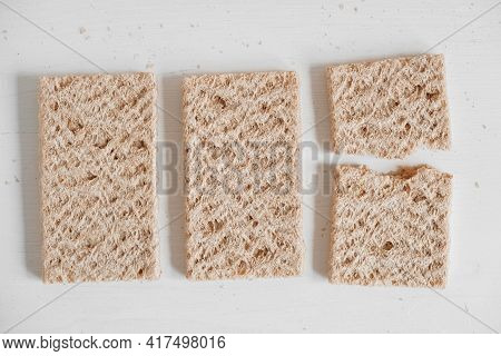Rye Crisp Bread On A White Wooden Background. Top View. Copy, Empty Space For Text
