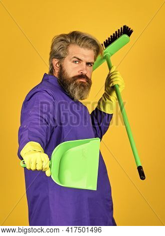 Janitor Professional. Bearded Hipster Blue Uniform With Broom. Gardener Cleaning Service Man. Garbag