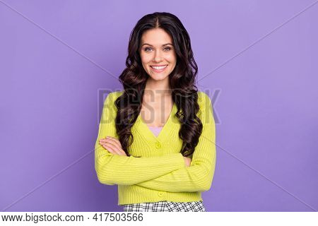 Photo Of Cute Confident Lady Crossed Hands Beaming Smile Wear Green Cardigan Isolated Purple Color B