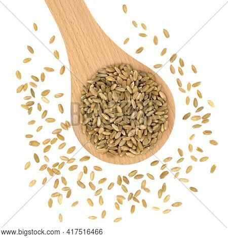 Vegan and vegetarian freekah rice health food on a white background. High in protein, fibre, vitamins, minerals with caretonoids for healthy ageing also good for bone and muscle health. Top view.