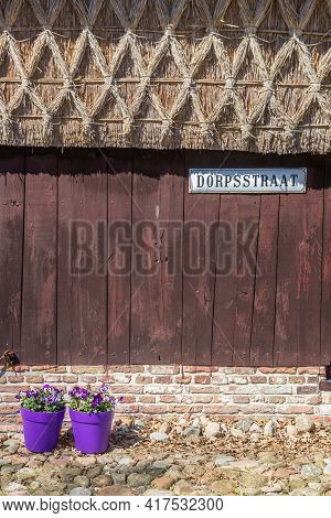 Sign With Street Name On A Historic Building In Orvelte, Netherlands