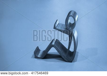 Abstract Isolated Object Of A Green Color Printed On A 3d Printer On Surface