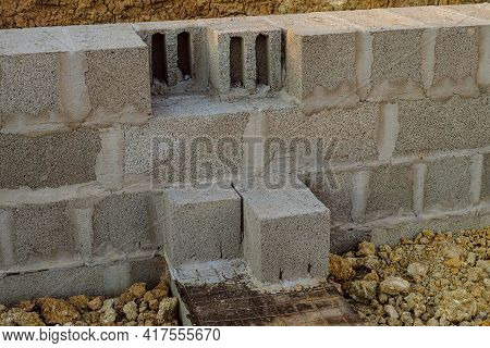 Masonry Walls Made Of Heavy Concrete Blocks. Stone Walls Of A Building From Hollow Concrete Blocks O