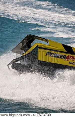 Airlie Beach, Queensland, Australia - April 2021: The Back Of A Jet Boat As It Spins In The Water Gi