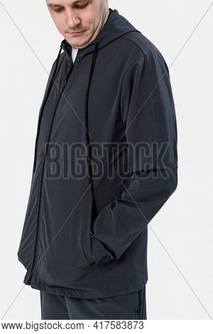 Man wearing black co-ord sportswear
