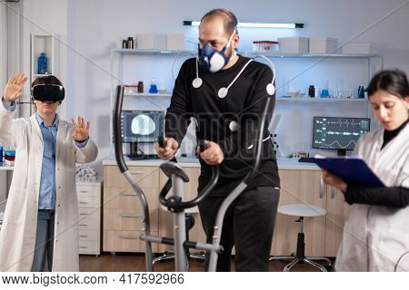 Sport Performance Scientist Experiencing Virtual Reality Goggles
