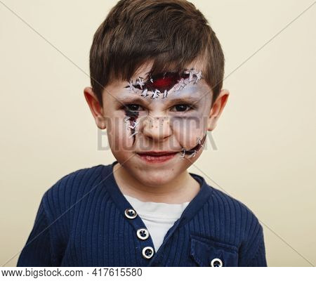 Little Cute Child With Facepaint On Birthday Party, Zombie Apocalypse Facepainting, Halloween Prepar