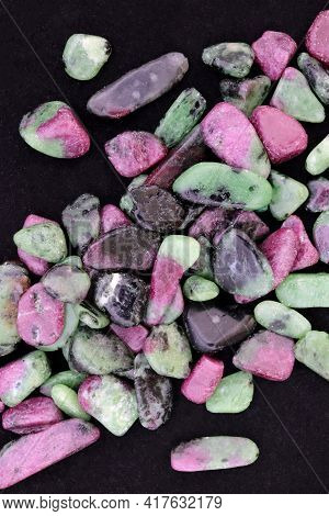 Ruby Zoisite Jewel Stones Heap Up Texture On Black Background