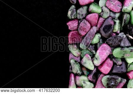 Ruby Zoisite Jewel Stones Heap Up Texture On Half Black Background